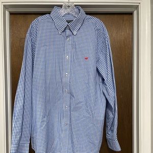 Blue and white checkered long sleeve button up shirt.
